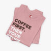 Folded view of a Coffee First t-shirt in Orchid